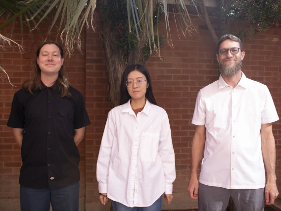 Josh, Dr. Zheng, and Dr. Eckstrom all pose for a group photo 