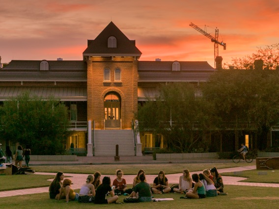 Old Main Sunset with Students