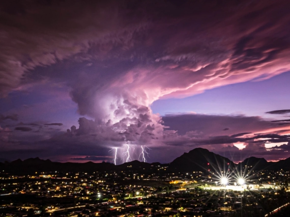 A storm cloud over a city