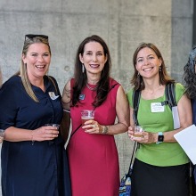Lee Ryan, Ashley Jordan, Rebecca Gomez, Martha Bhattacharya, and Mary Frances O'Connor stand together smiling at the 2022 Annual Faculty Reception