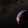 Artist's concept of an giant gas planet in the foreground with a star, in this case Alpha Centauri A, in the distance. 