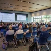 Tomás Díaz de la Rubia speaking to a room of seated people